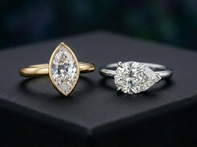 Bezel Set Marquise diamond Ring and East West Set Pear Diamond Ring